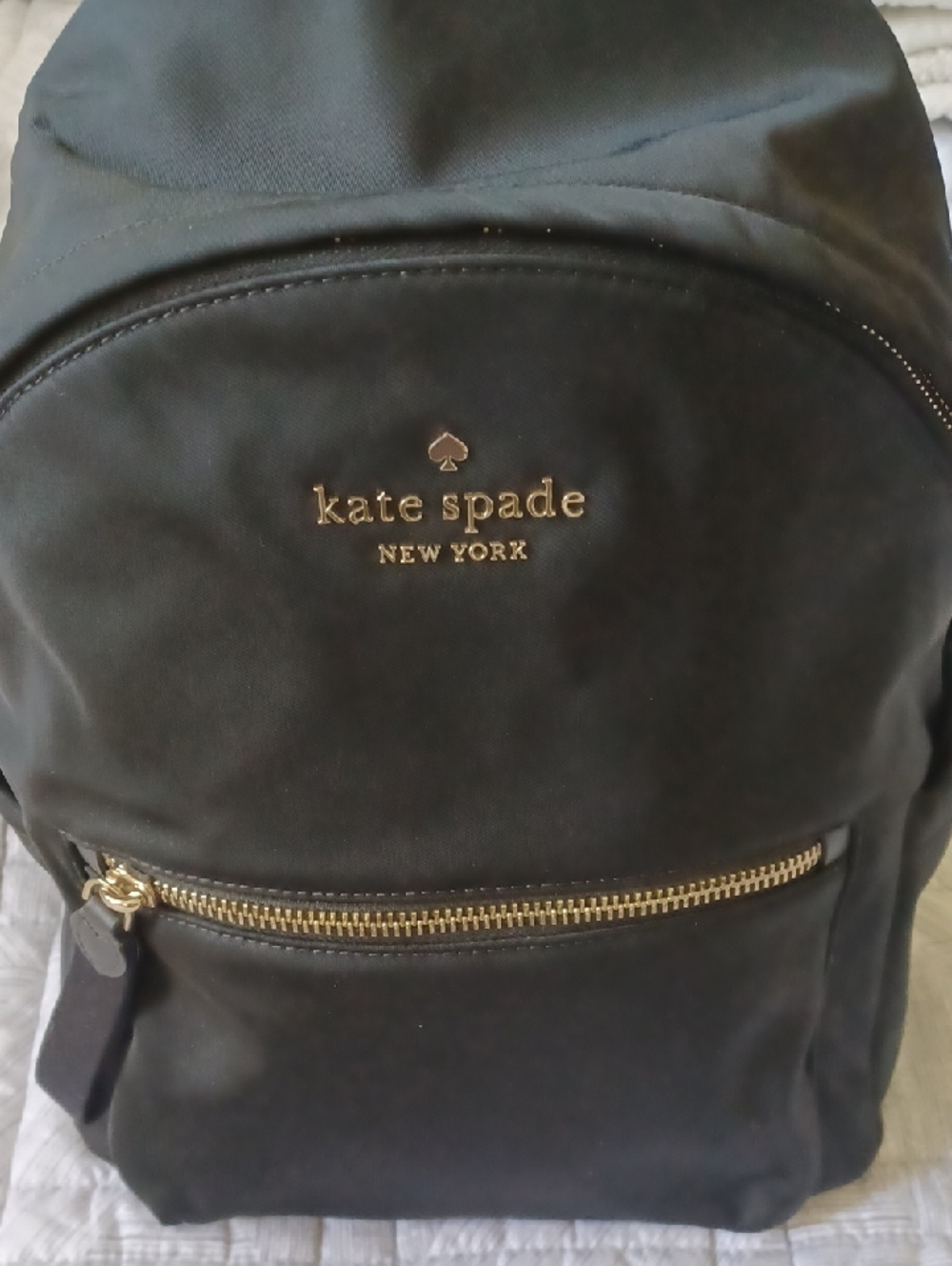 kate spade black backpack with gold hardware
